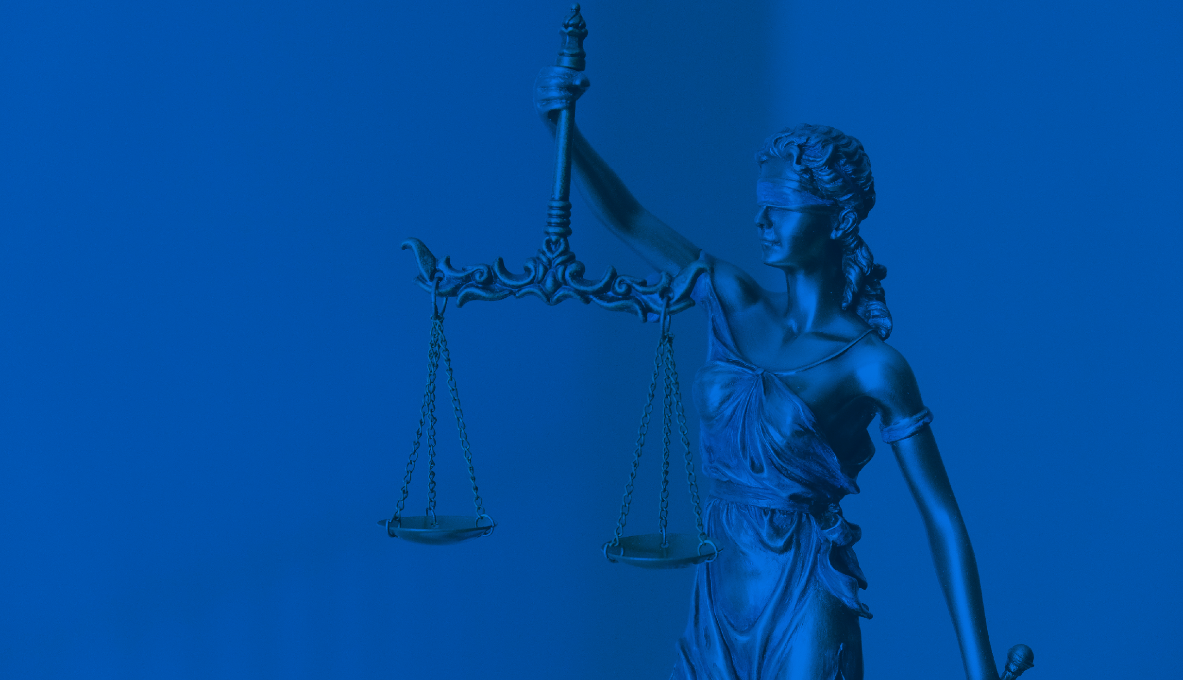 A statue of Lady Justice holding scales