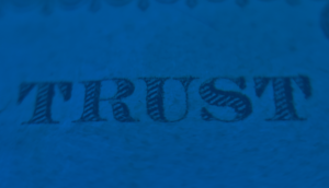 The word trust printed on paper